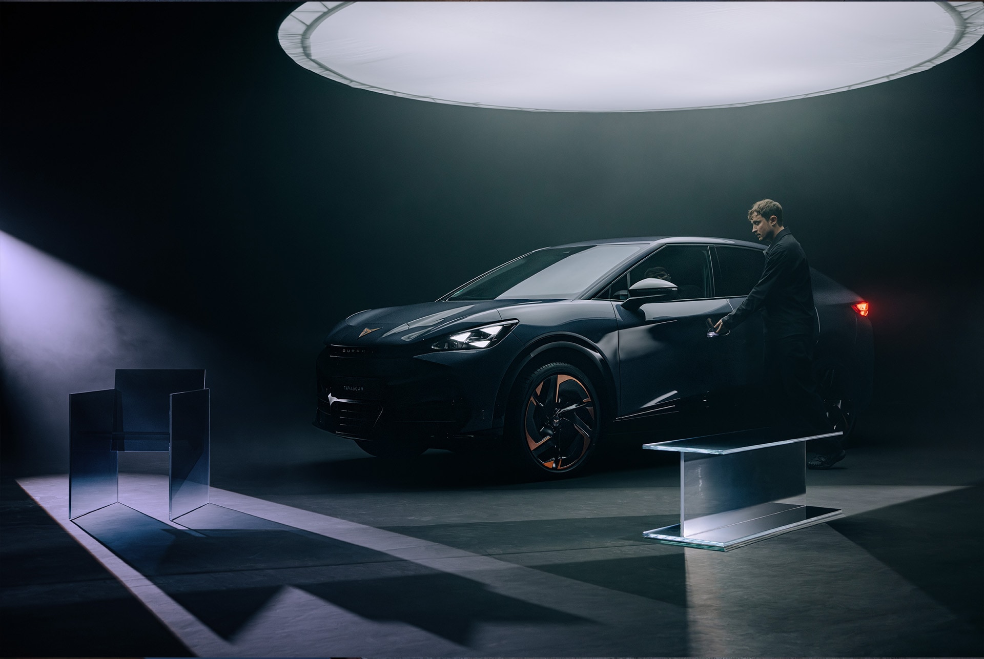 CUPRA Born VZ in Dark Forest Green in urban surroundings