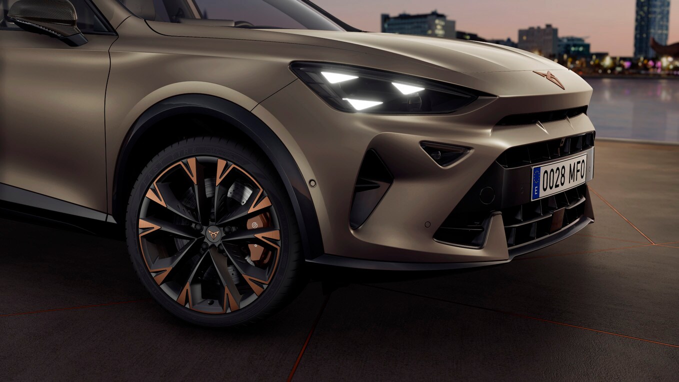 dark forest cupra born electric vehicle in motion