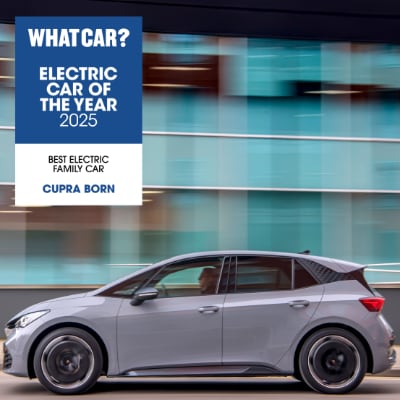 CUPRA Born in side profile with WHAT CAR? logo and award for Best Electric Family Car 2025