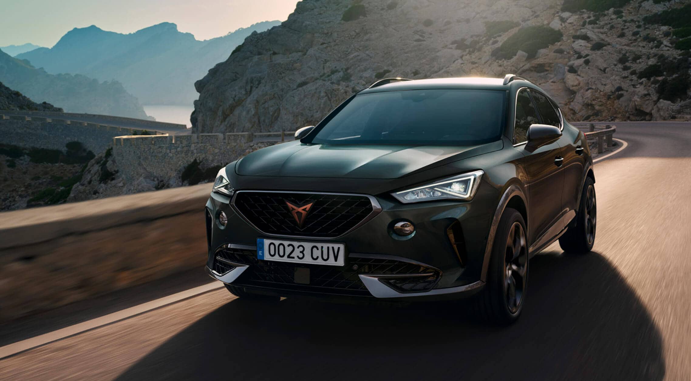 A CUPRA Formentor driving along a winding road