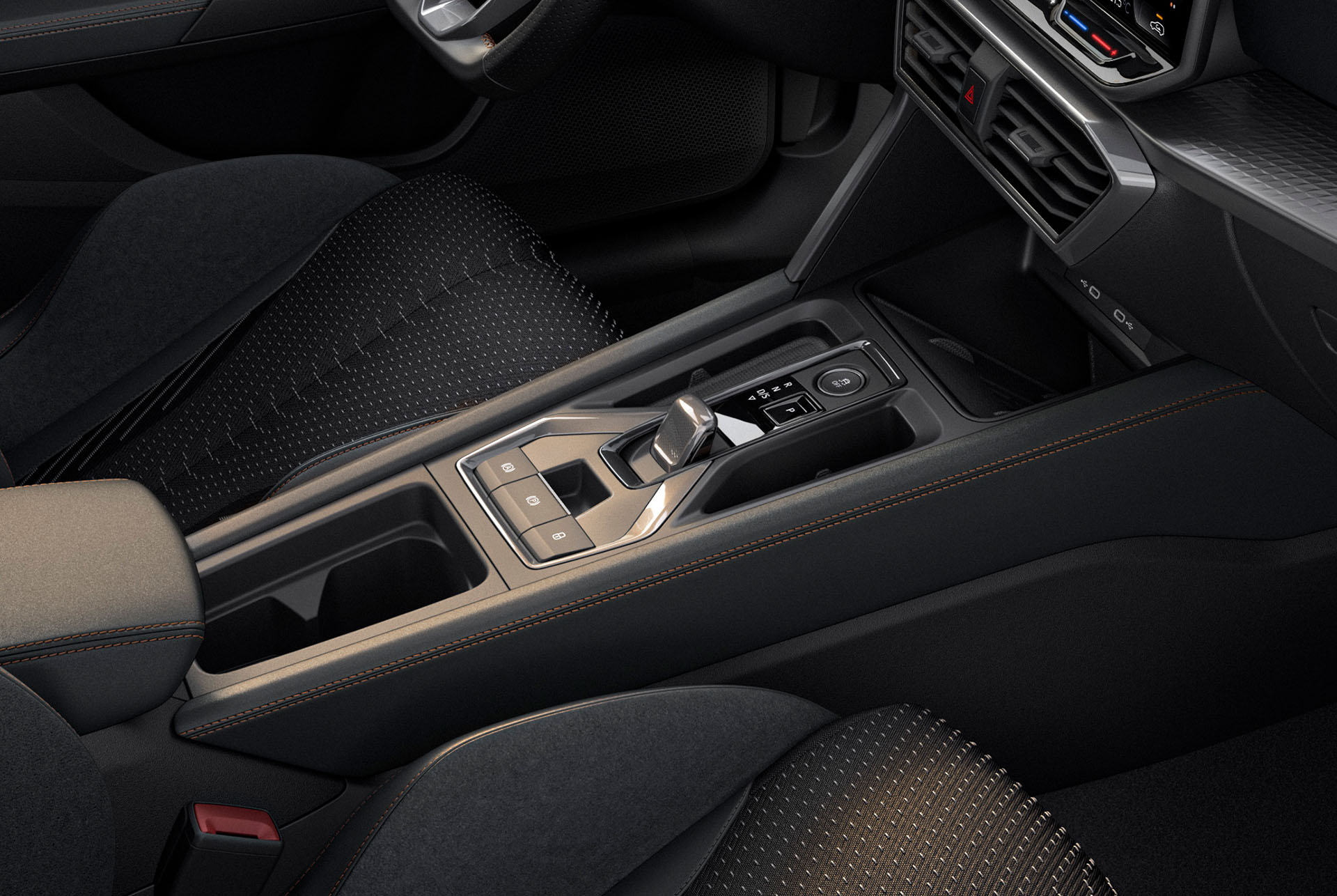 Close up of a CUPRA Leon hybrid car interior design central console, CUPRA connect controls, copper stitching, black and metallic trim.