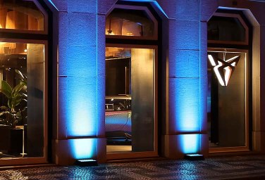 blue lights shining on Cupra city garage Lisbon
