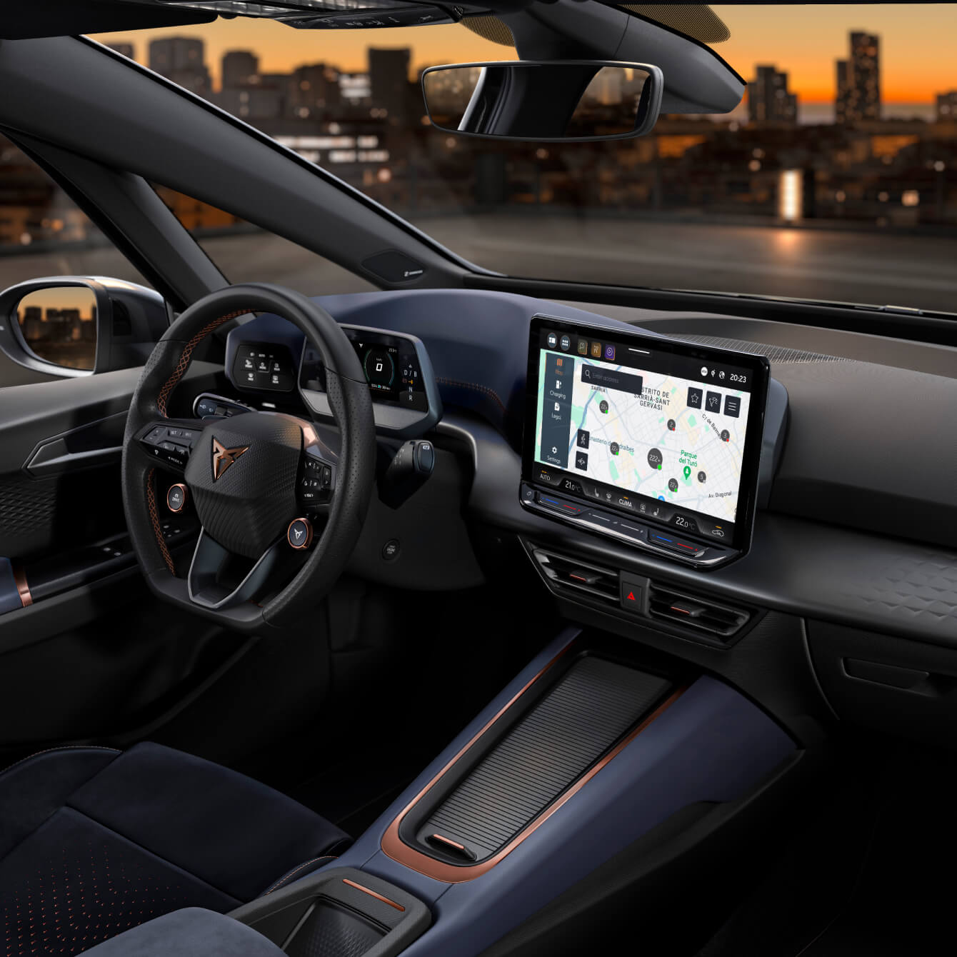 Panoramic interior view of a CUPRA Born with Aurora Blue upholstery and charging points displayed on the dashboard.