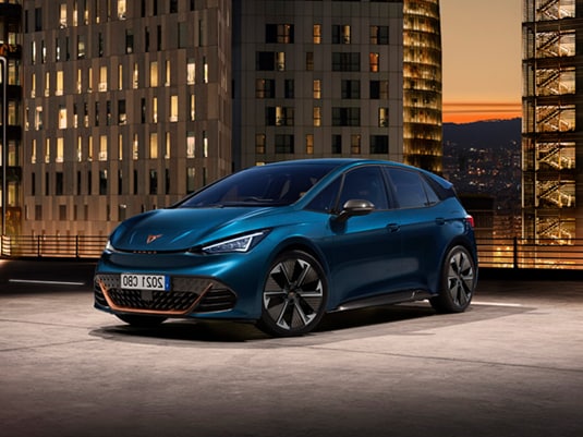  3/4 front view of the cupra born eboost in Aurora Blue with 20 inch alloy wheels