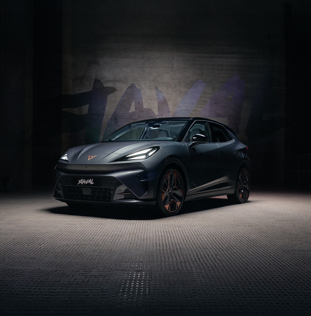 CUPRA Raval electric car front three-quarter view against a graffiti-style Raval backdrop.
