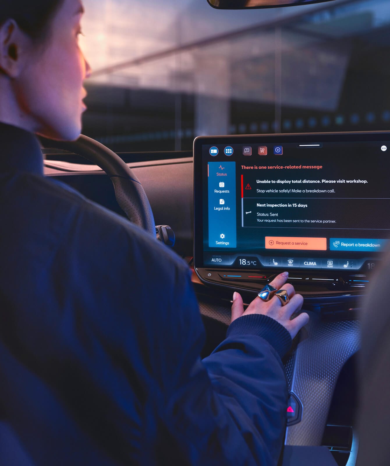 CUPRA Tavascan interior showing touchscreen interface, illustrating the remote access and digital services available through CUPRA CONNECT.