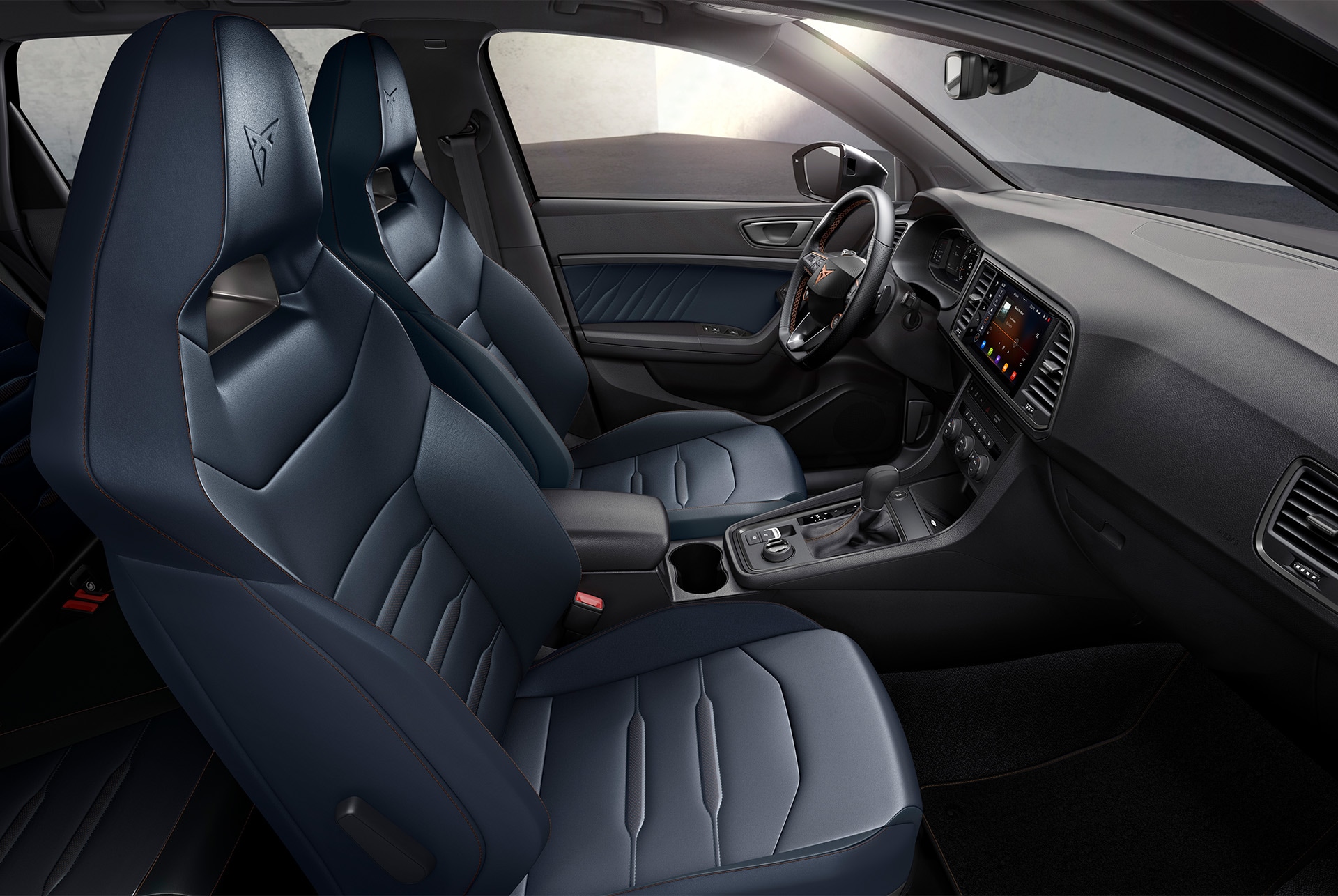 Interior view of the CUPRA Ateca with Petrol Blue Nappa leather Bucket seats, featuring exclusive Copper stitching and progressive fabrics.