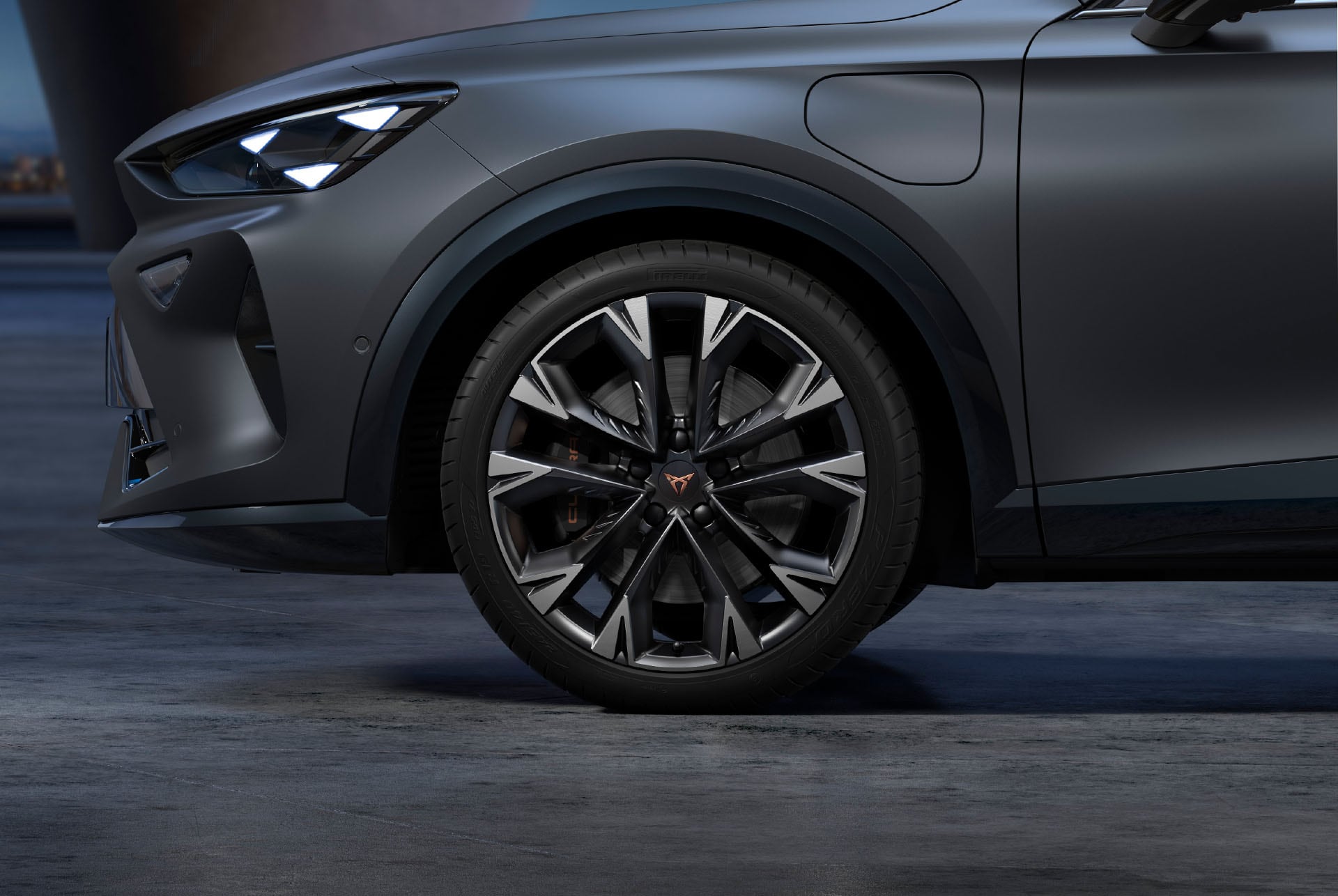 New artic silver and black CUPRA Formentor 2025 alloy car wheels, and tyres with logo in the middle, LED headlights.