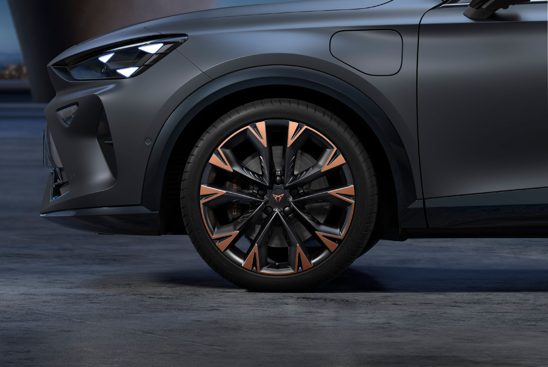 New artic copper and black CUPRA Formentor 2025 car wheels, alloys and tyres with logo in the middle, LED headlights.