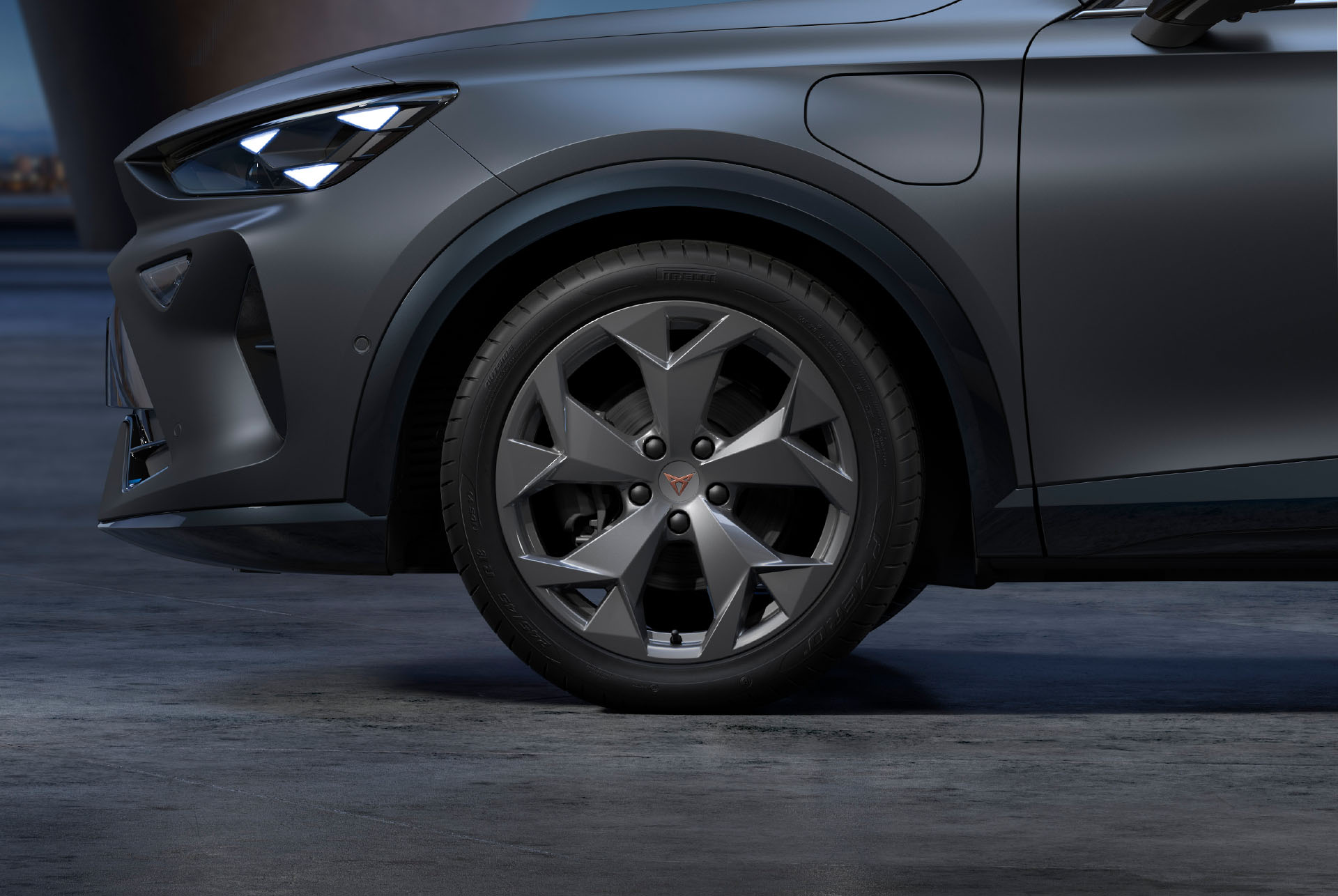 New tempest silver CUPRA Formentor 2025 alloy car wheels and tyres with logo in the middle, LED headlights.