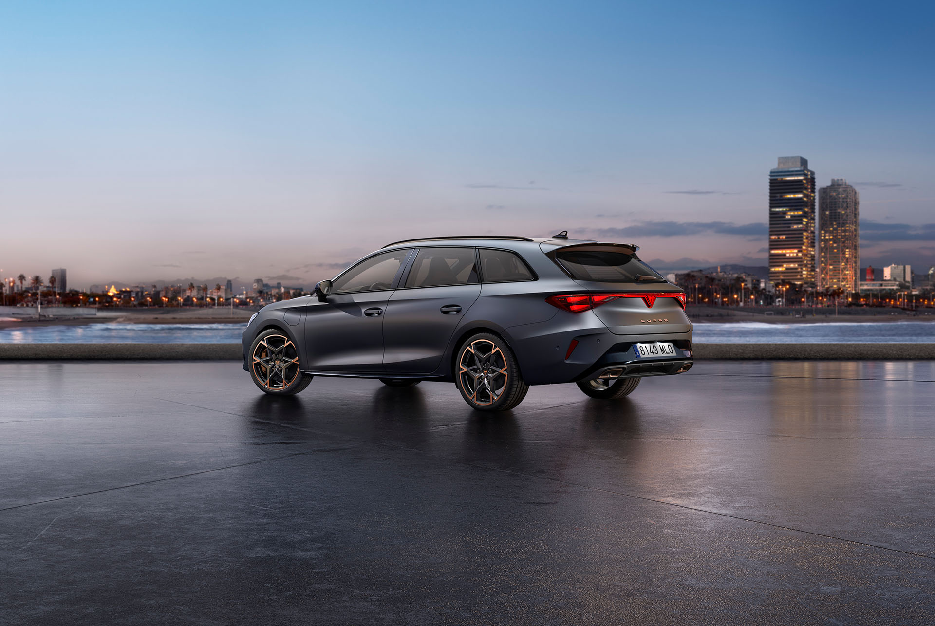 The CUPRA Leon SP parked in a diaphanous urban setting at sunset, showcasing its side and partial rear design details. 