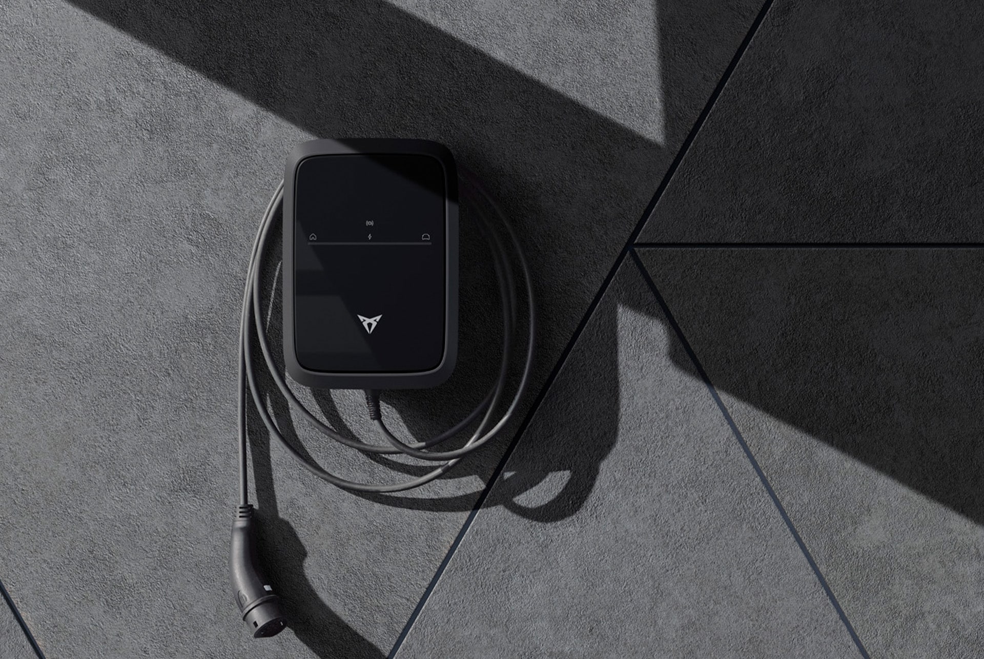 close-up shot of the cupra charger to showcase how easy is to charge your leon at home, and faster than ever.