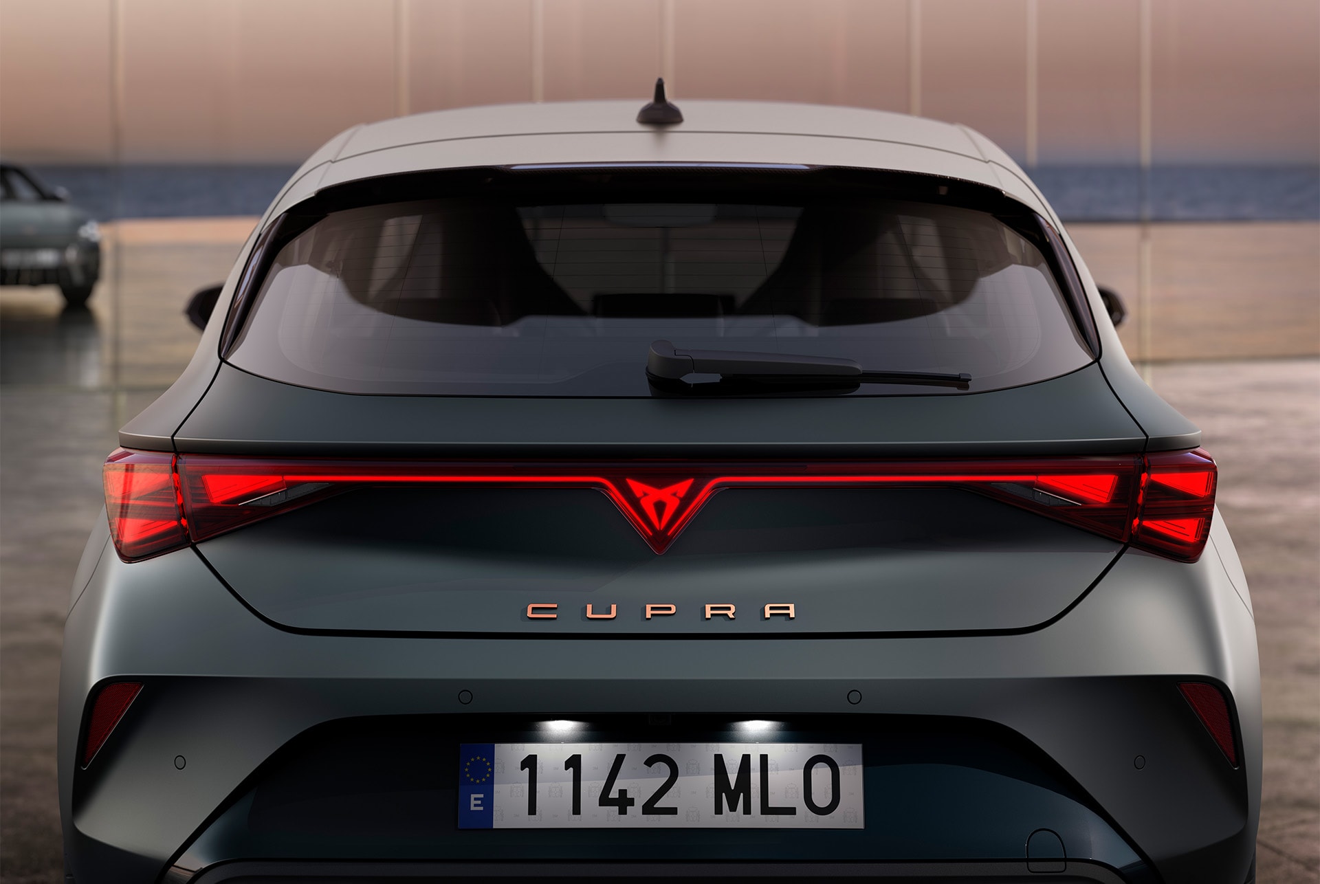 view of cupra leon hybrid car's boot and rear lights, LED lighting, integrated led cupra logo