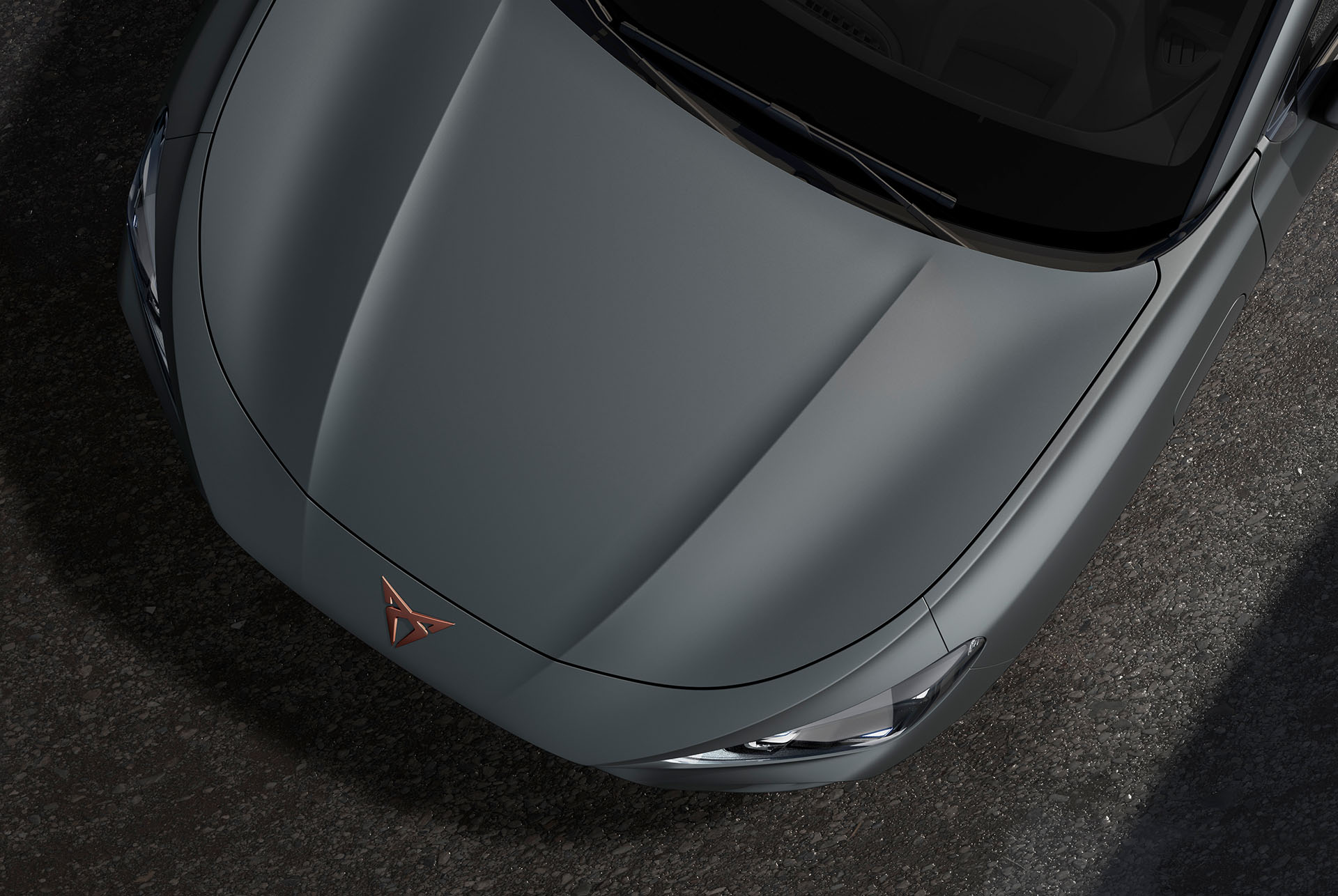 cupra terramar, enceladus grey matt colour, top-down view of the front hood and headlights.