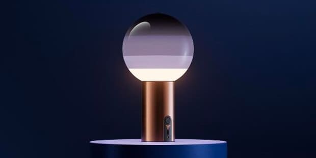 Marset Dipping Light lamp, gold base, gradient glass shade.