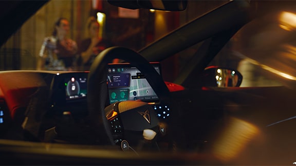 cupra born interior view of the steering wheel and 12.9 infotainment screen