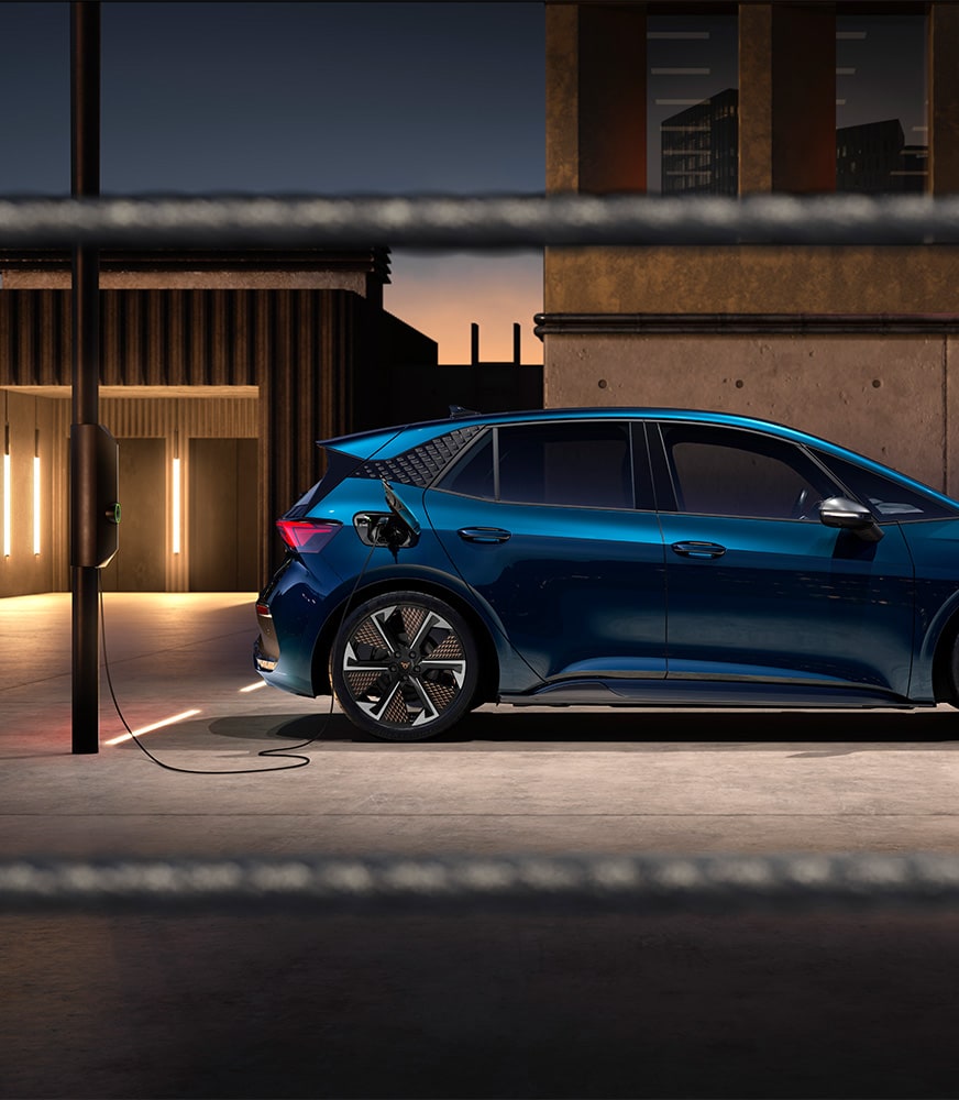 cupra-born-aurora-blue-colour-bumper-rear-view-plug-into-a-cupra-%20charger