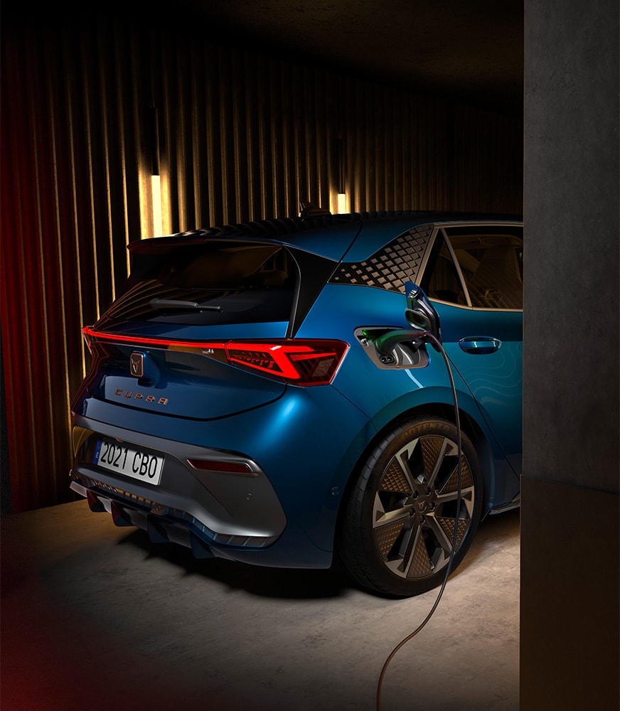 cupra-born-aurora-blue-colour-plugged-into-a-cupra-charger%20